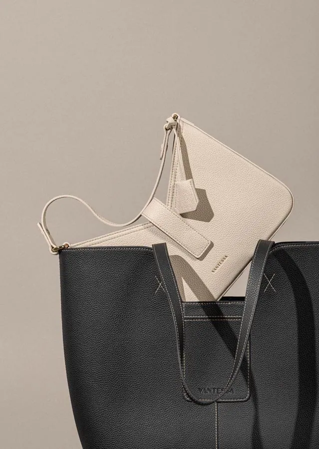 Leather handbags photographed on a minimal studio set