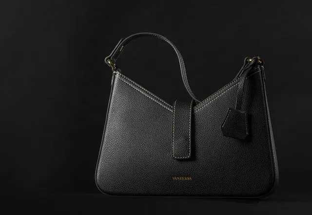 Leather handbags photographed on a minimal studio set