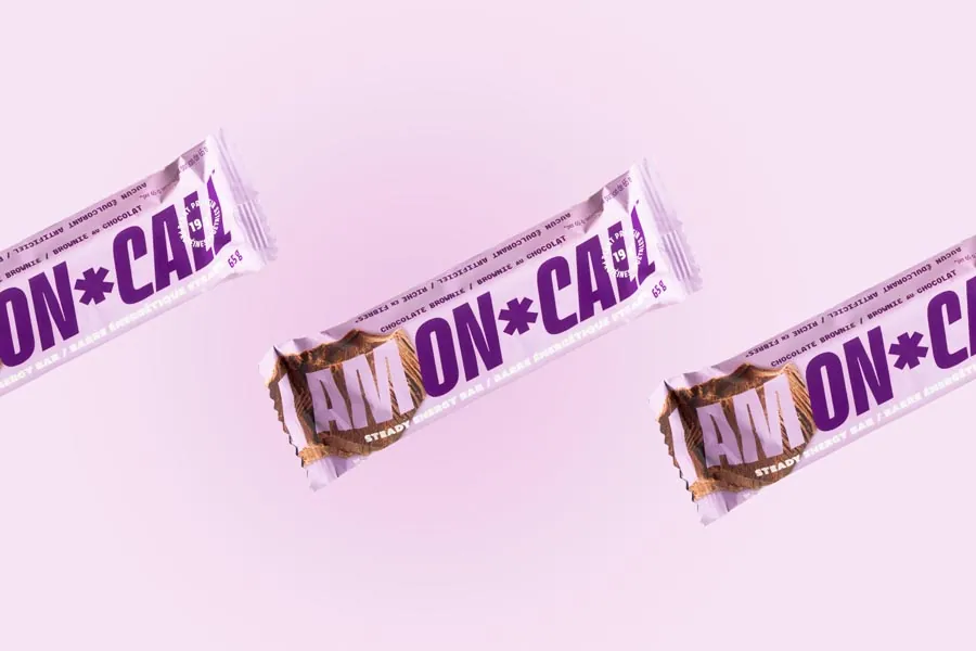 Packaged snack bars shot on bold coloured seamless backgrounds