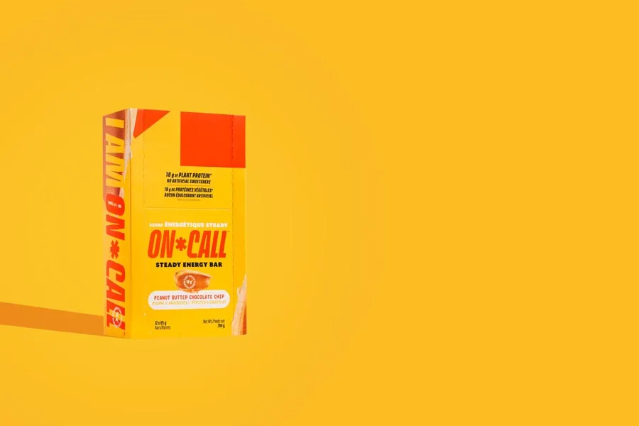 Packaged snack bars shot on bold coloured seamless backgrounds