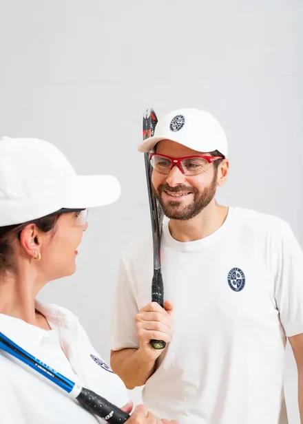 Players in club-branded whites, brand photography by lightwrk, Toronto